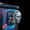 The Official The Walking Dead Remastered Interactive Shooter Knob Accessory featuring an illuminated zombie head design
